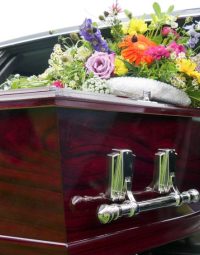 Unloading Casket From Car — Newhaven Funerals in Brisbane