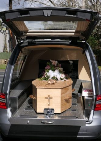 Casket Inside The Car — Newhaven Funerals in Brisbane