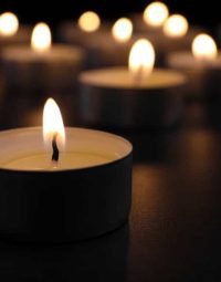 Burning Candle — Newhaven Funerals in Brisbane