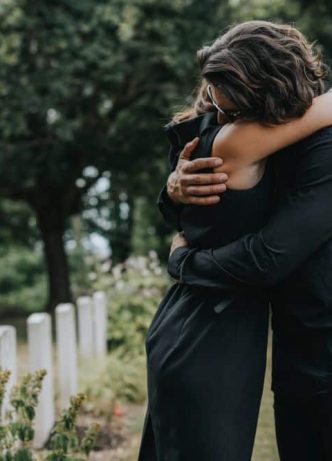 Couple Hugging after a funeral on the Gold Coast