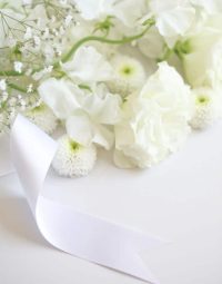 White Flowers And Ribbon — Newhaven Funerals in Brisbane