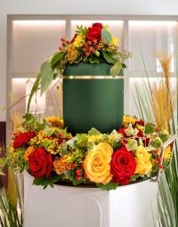 Urn With Colourful Flowers — Newhaven Funerals in Brisbane