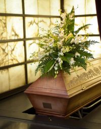 Wooden Coffin in Crematorium — Newhaven Funerals in Brisbane