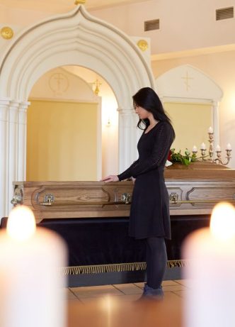 Sad Woman With Coffin —