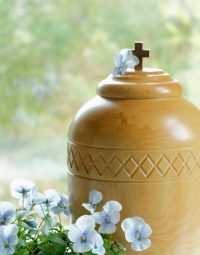 Urn Decorated With Flowers — Newhaven Funerals in Brisbane