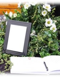 Funeral Signing Book Next To Frame — Newhaven Funerals in Brisbane