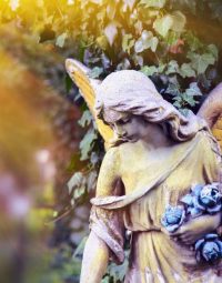 Statue of Golden Angel — Newhaven Funerals in Brisbane