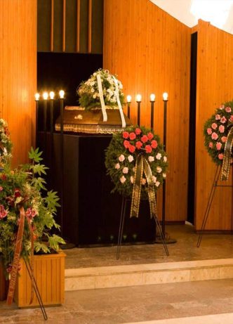 Coffin And Flowers — Newhaven Funerals in Brisbane
